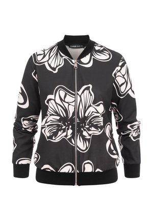 Sort bomberjakke med hvidt, markant blomsterprint, foran lynlås, ribstrikket krave, manchetter og kant.