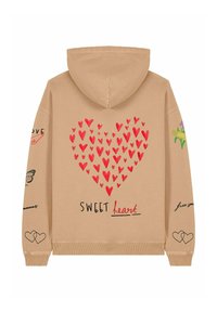 Bež dukserica s velikom crvenom grafikom srca, natpisom "SWEET heart" i cvjetnim dizajnom na rukavima. Izvezeni detalji i tekst.