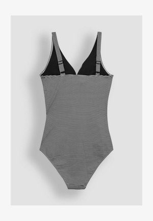 Fekete és fehér csíkos, egyrészes fürdőruha állítható pántokkal, a tetején szilárd fekete panellel és magas szabású lábformával.