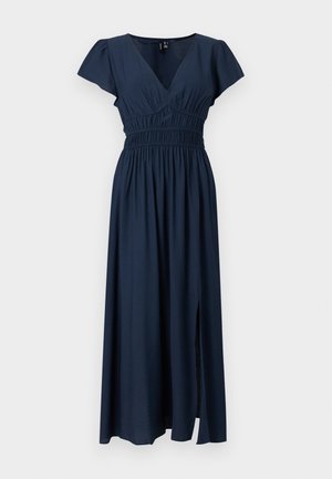 Tumesinine keskmise pikkusega kleit V-kaeluse, lühikeste paela varrukate, elastse voltimisega vöökohas ja seeliku ees oleva lõhikuga.