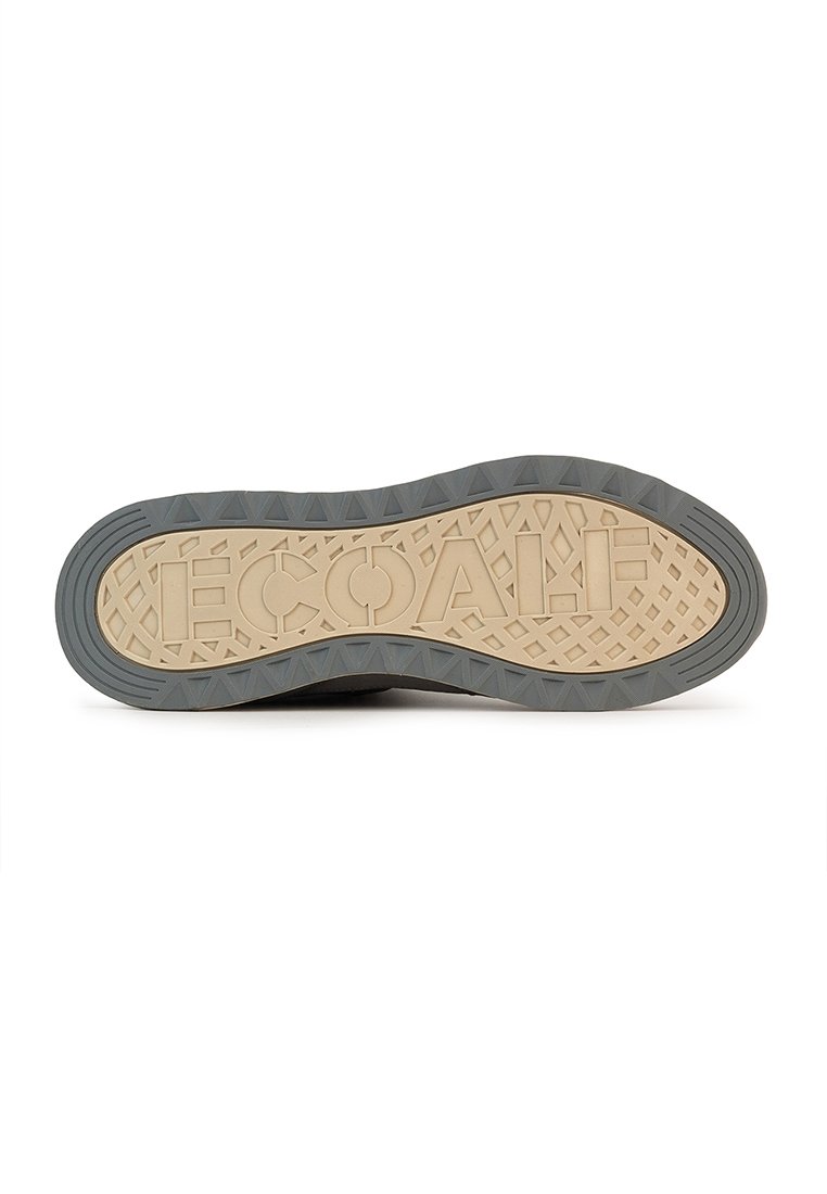 Suela de zapato con una parte superior de goma gris texturizada y una suela exterior beige con patrón, que presenta la palabra "ECOALE" grabada en el centro.