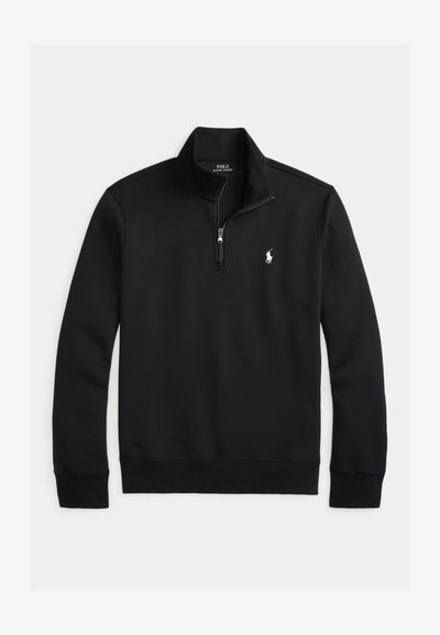 Μαύρο φούτερ με πλεκτό ύφασμα από βαμβακερό μείγμα. Διαθέτει γιακά με φερμουάρ, ριμπ μανσέτες και τελείωμα, με μικρό λευκό λογότυπο στο στήθος.