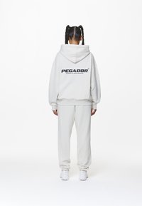 Pegador ATNA LOGO - Mikina - washed salty cream
