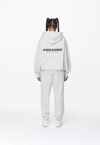 Pegador - ATNA LOGO OVERSIZED HOODIE - Gornji dio trenirke - washed salty cream Minijatura 1