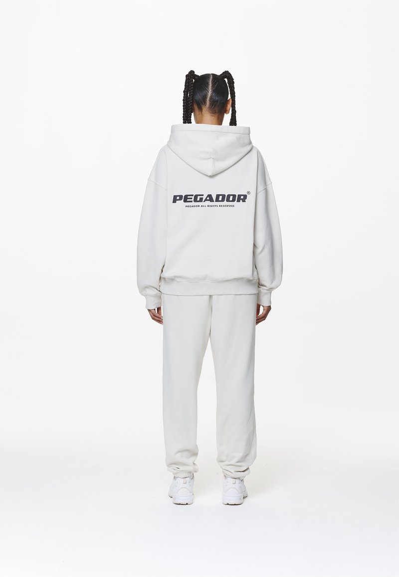 Pegador - ATNA LOGO OVERSIZED HOODIE - Gornji dio trenirke - washed salty cream, Povećaj