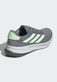 adidas Performance SUPERNOVA  - Trail running shoes - grey three   semi green spark   dash grey