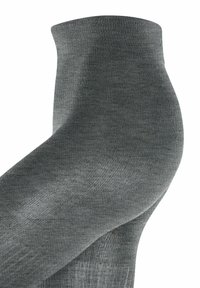 Calze grigie aderenti realizzate in un tessuto liscio e dalla texture piacevole. Presentano un bordo a coste nella parte superiore e un design senza cuciture per il massimo comfort.