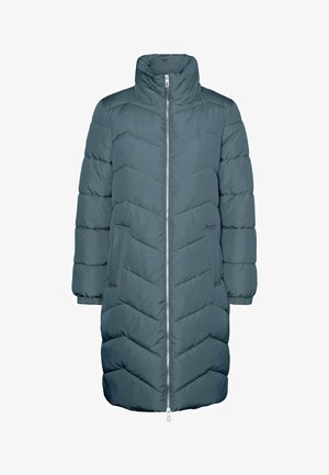 Garšs pūkains mētelis tumši tirkīza krāsā, ar augstu apkakli, priekšējo rāvējslēdzēju un sānu kabatām. Zibens šuvums piešķir tekstūru un vizuālo dizainu.