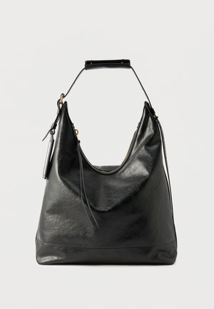 Black leather hobo bag with a single shoulder strap, gold-tone hardware, zipper closure, and subtle front logo detail.