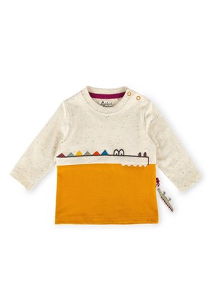 Langärmliges Hemd in Creme und Senfgelb, mit bunten, dreieckigen Akzenten auf der Brust und einem dekorativen Reißverschlussdetail.