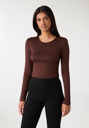 - Bluzka z długim rękawem