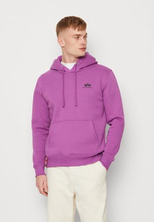 Purple cotton hoodie with a front pocket, drawstring adjustable hood, and a black logo on the chest. Ribbed cuffs and hem.