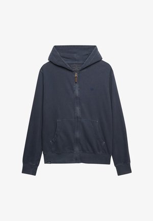 Mørkeblå hættetrøje med fuld lynlås, frontlomme og ribkant ved ærmer, med lille broderet logo på brystet.