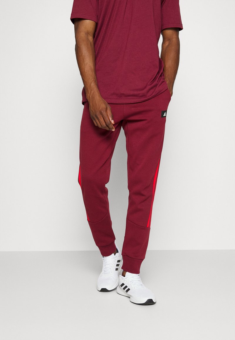 adidas Performance PANT Tracksuit bottoms shadow red/red Zalando.ie