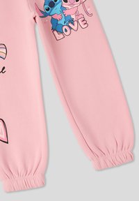 Felpa rosa con maniche lunghe, caratterizzata da una grafica di due personaggi dei cartoni e la parola "AMORE". Tessuto morbido con polsini elastici.