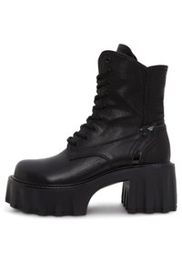 Botines con plataforma - black