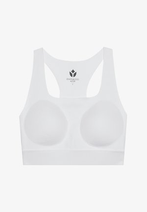 Bela športna modrček z oblikovanimi skodelicami, širokimi naramnicami in gladko teksturo. Ima logotip na notranji strani. Minimalistična zasnova in brezšivni končni izgled.