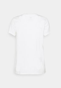 T-shirt blanc uni à manches courtes montré de dos sur un fond neutre, avec un col rond et une coupe standard.