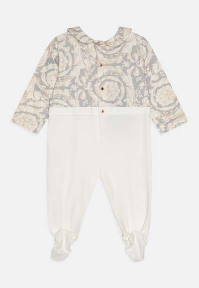 Langermet rompers med grå blomsterdesign øverst og kremfarget underdel, med treknapper, tettsittende mansjetter og fotdesign.