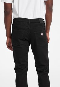 Guess Jeans SLIM  - Slimfit džínsy - schwarz
