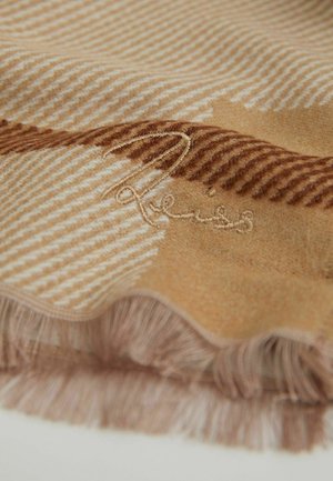 Ternede beige og brune tørklæde med frynsekanter og broderede detaljer. Blød tekstur med skiftende striber og en varm farvepalet.