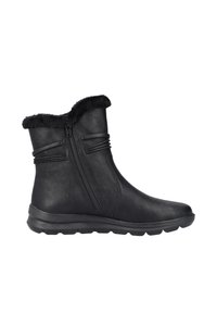 Bottines noires en cuir lisse, avec une bordure en fausse fourrure, une fermeture éclair sur le côté et une semelle en caoutchouc texturée pour une meilleure adhérence.