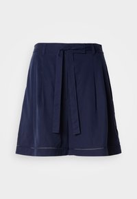 Shorts bleu marine en tissu doux et léger. Présentent une taille ceinturée, des plis à l'avant et un design minimaliste avec des coutures discrètes.