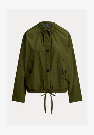 Õlivihmroheline kerge kangaga jakk, millel on nööriga vöökoht, kaks esist taskut ja nööpidega sulgumine koos konkskurrukraega.