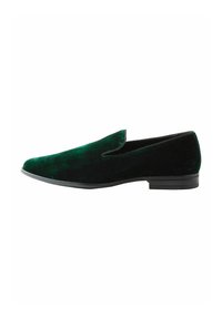 Green velvet slip-on shoe with a black rubber sole, featuring a smooth texture and minimalistic design, angled for side view.