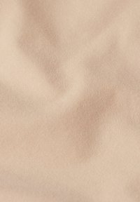 Lichtbeige stof met een zachte textuur en een subtiel diagonaal geweven patroon. Glad en iets rekbaar, ideaal voor comfortabele toepassingen.