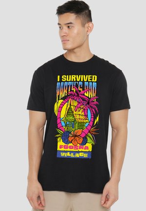 Black cotton t-shirt featuring a colorful graphic print with palm trees, a hut, and text reading "I Survived Party’s Bar, Foosha Village."