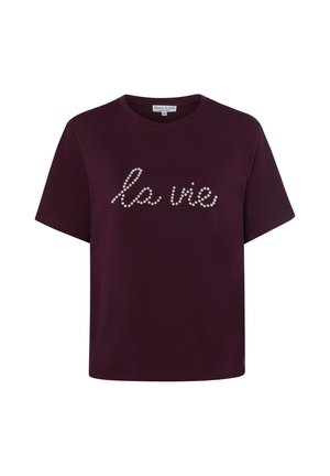 Maglietta viola scuro a maniche corte con scollo rotondo e la frase "la vie" scritta sul davanti con piccole perline simili a perle.
