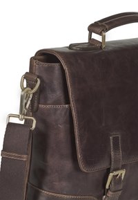Brown leather messenger bag with textured surface, a top handle, adjustable fabric strap, and metal hardware accents. Fold-over flap closure.