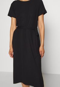 Object Trikoomekko - black