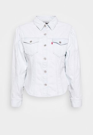 Light blue denim jacket featuring a pointed collar,-buttoned front, two chest pockets, and subtle vertical seams. Silver hardware accents.