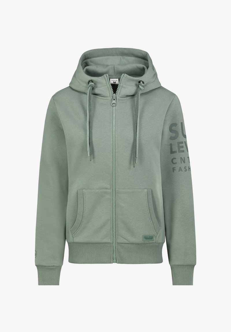 Helle grüne Zip-Hoodie aus weichem Stoff, mit einer Kängurutasche, Kapuze mit Zugband und bedrucktem Text am Ärmel.