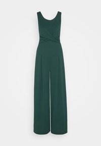 Combinaison verte sans manches avec un corsage ajusté, détail tordu à la taille et pantalon large, fabriquée en tissu lisse.
