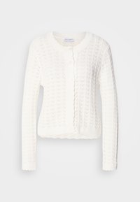 Hvit strikket cardigan med et teksturert sikksakkmønster, ribbestrikket rund hals og bølget kant. Knapplukking foran.