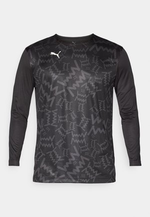Langermet svart treningsskjorte med et teksturert abstrakt mønster i mørkere nyanser. Har en hvit Puma-logo på øvre venstre bryst.