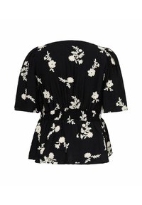 Mustast pluus valge lillelise tikandiga, poosetega lühikeste varrukatega, kitsendatud vöökohaga ja pähikujulise äärega, näidatud tagantpoolt.