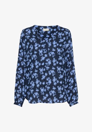 Blusa azul marino con escote en V, mangas largas y un patrón floral en azul claro. Está confeccionada en una tela ligera y presenta un diseño holgado.