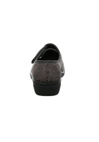Gray shoe with floral pattern, rounded back, and adjustable strap. Features a textured upper and a sturdy black sole.