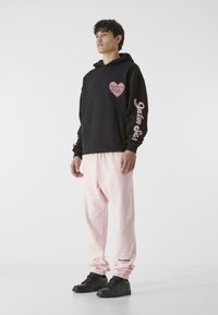 9N1M SENSE ESSENTIAL - Träningsbyxor - pink