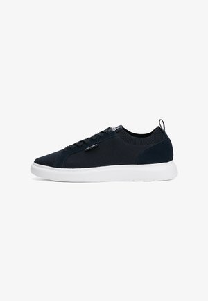 Navy blue sneakers with a breathable mesh upper, white rubber sole, laces, and a rear pull tab; features smooth suede accents.