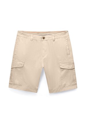 Beiget väriset cargo-shortsit, joissa edessä nappi, vetoketju, vyölenkit, sivutaskut ja läppätaskut kummassakin reisissä, aseteltuna tasaiselle valkoiselle pohjalle.