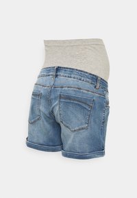 Denim shorts with a light blue wash, featuring a gray elastic waistband and rolled cuffs. Includes two back pockets.