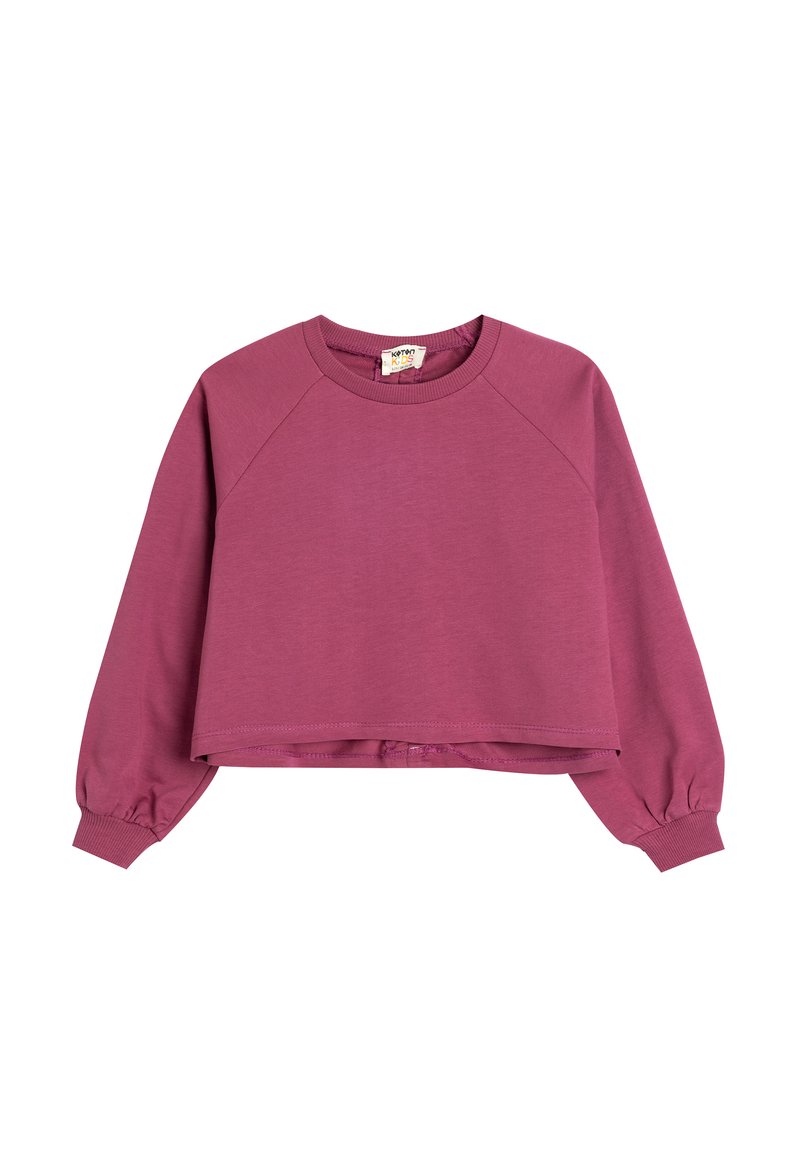 Felpa accorciata in un profondo mauve, realizzata in tessuto morbido. Presenta maniche raglan con polsini elasticizzati e un collo rotondo. Design semplice.