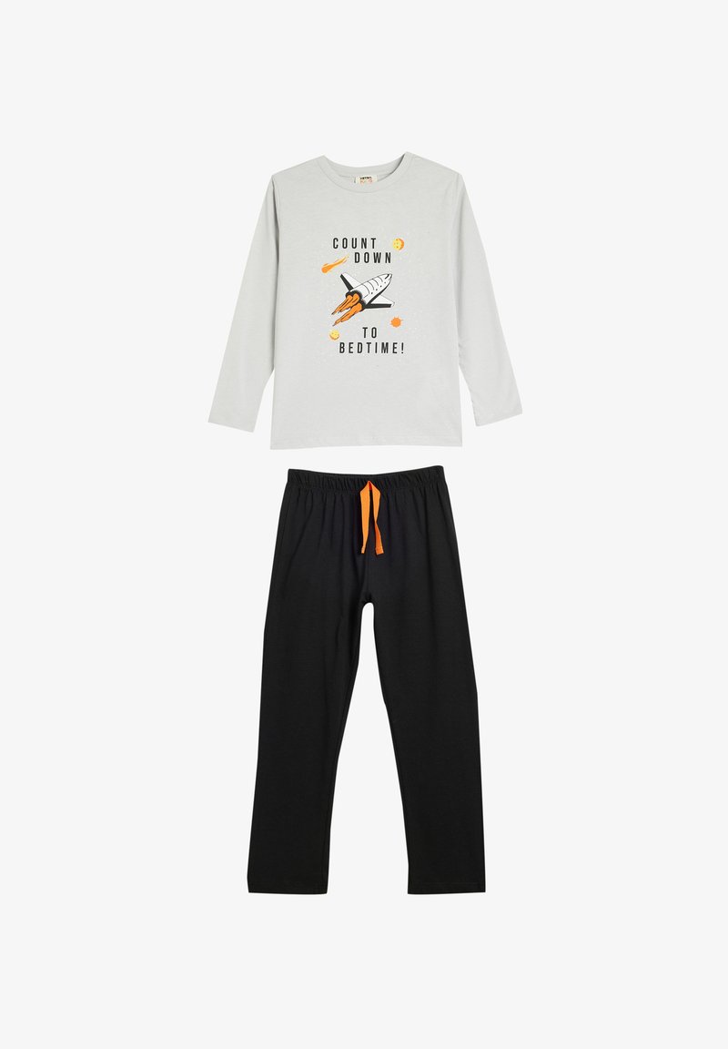 Light gray long-sleeve shirt with rocket graphic and black pajama pants featuring an orange drawstring. Cotton fabric, casual fit.