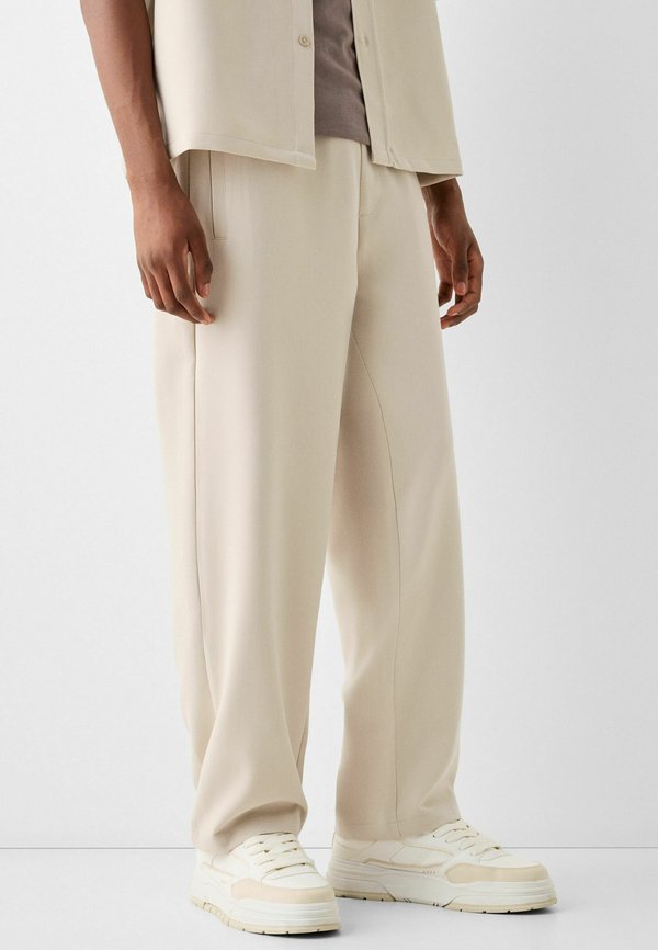 TAILORED - Jogginghose - sand