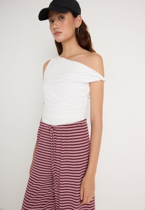 STRIPED TROUSERS - Bukse - pink/burgundy